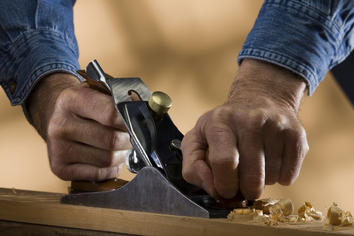 Person using a block plane